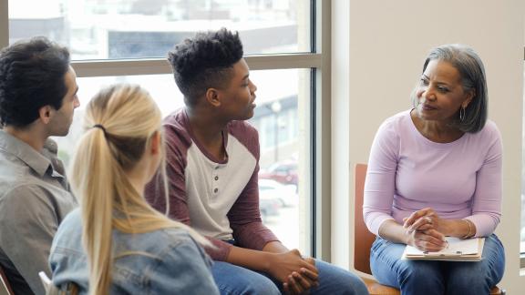 A young person sharing at group counselling.