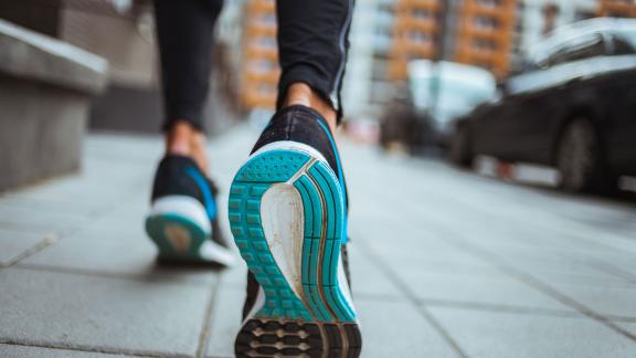 A close-up of a runner's shoes.