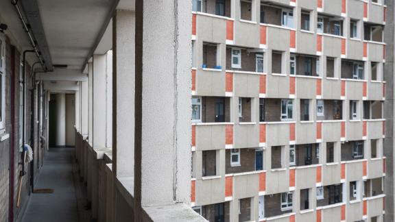 An inner-city block of flats, viewed from a walkway