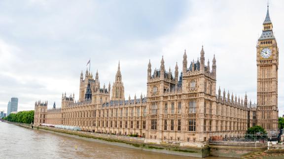 The Houses of Parliament viewed from across the River Thames.