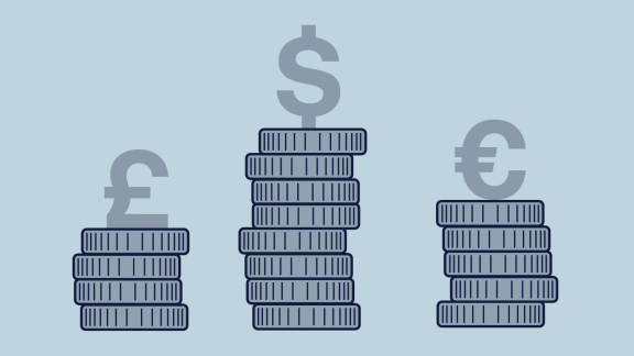 An illustration of piles of coins in different denominations.